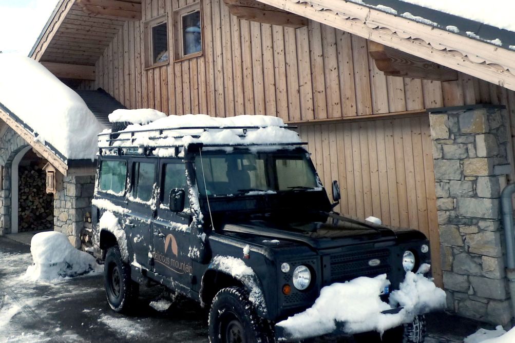Delicious Mountain jeep covered in snow