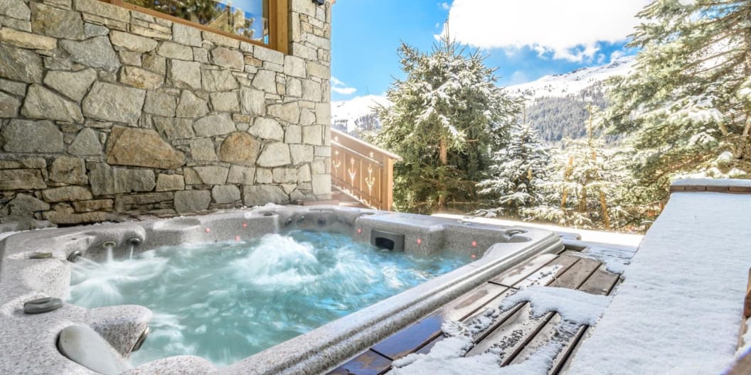 Outdoor hot tub with view from Meribel Chalet Phoebe