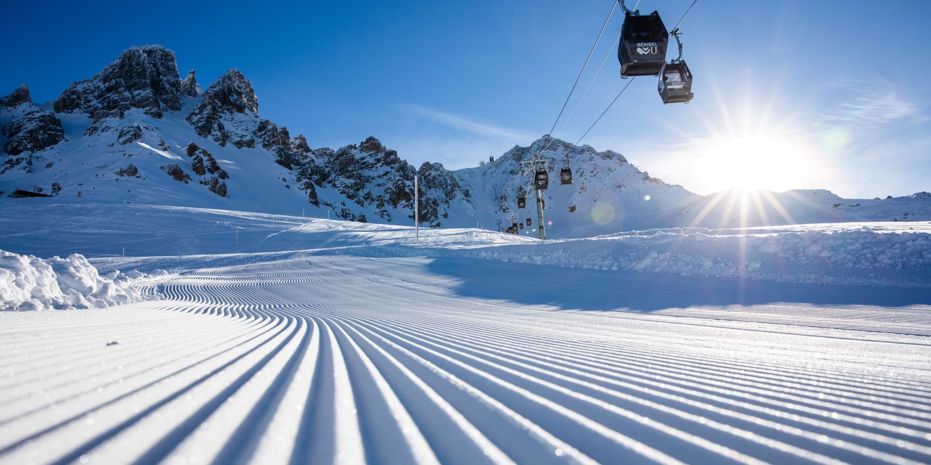 Freshly groomed piste below the gondola near Saulire, Meribel