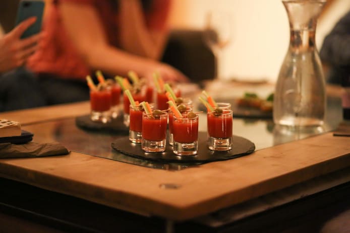 Fireside canapes served in a luxury catered chalet