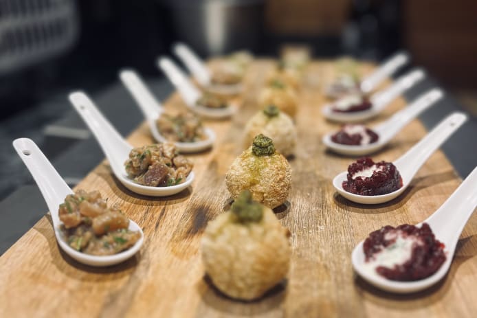 Fireside canapes served in a luxury catered chalet