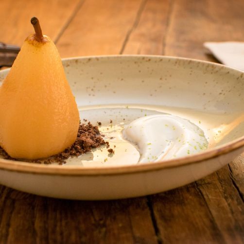Poached pear dessert in a catered chalet