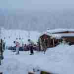 People gathering outside a Courchevel ski school